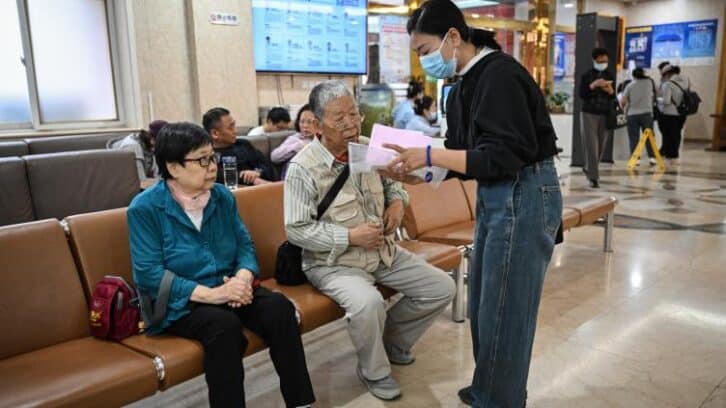 Image à la une de En Chine, des GPS humains pour naviguer dans le labyrinthe hospitalier